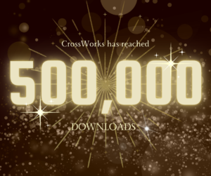 Bubbles, stars and rays of light in gold and a black background and the number "500,000" in gold in the middle.