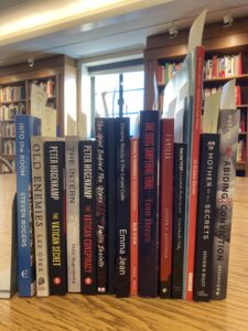 The spines of the books on display showing the titles and authors.